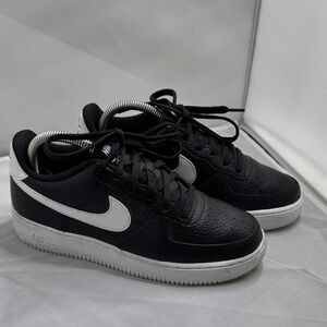 Big Kids Nike Air Force Ones. Black and White. Size 6 youth or women’s 7.5